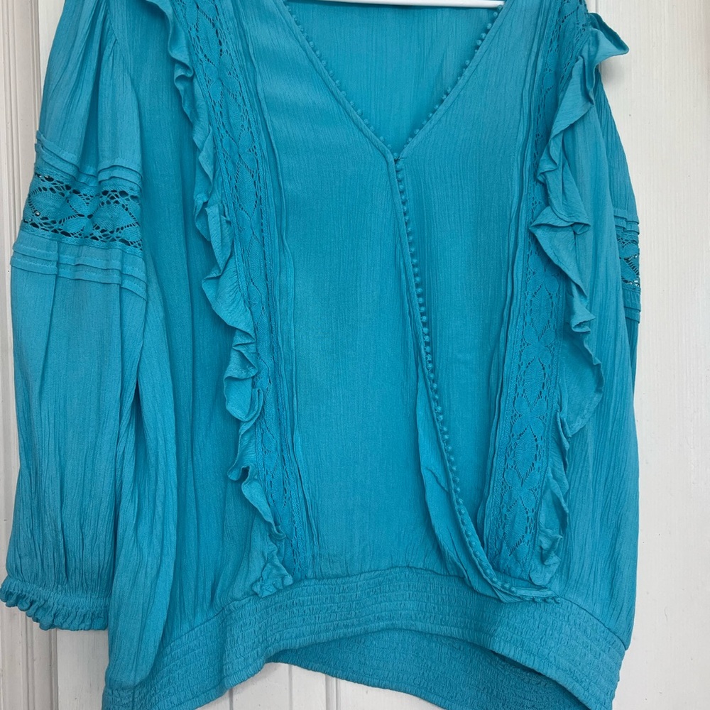 New York & Company Top. A Turquoise color with ruffles and lace.